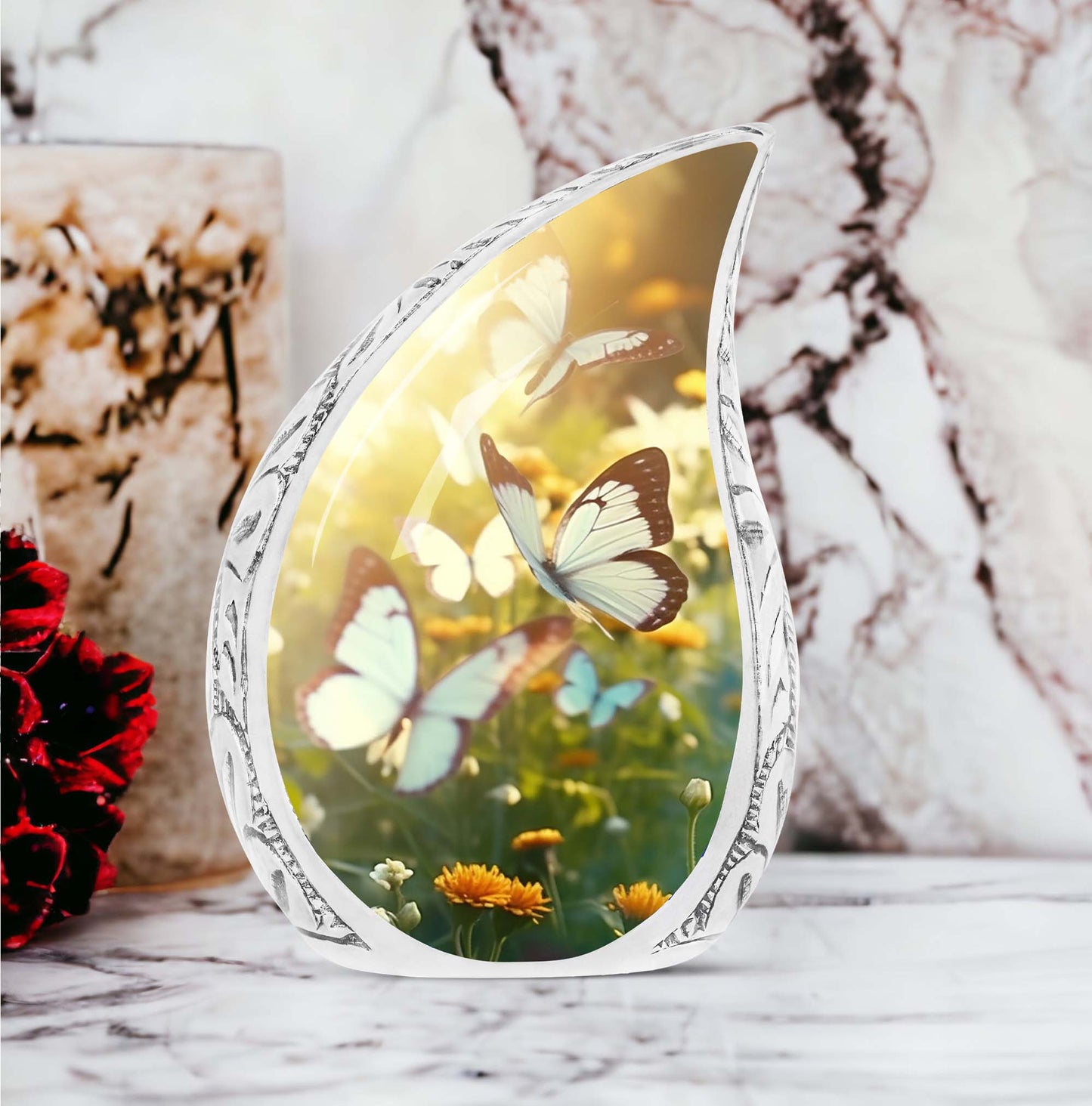 Butterflies flying over sunset imprinted on a large urn for adult human ashes