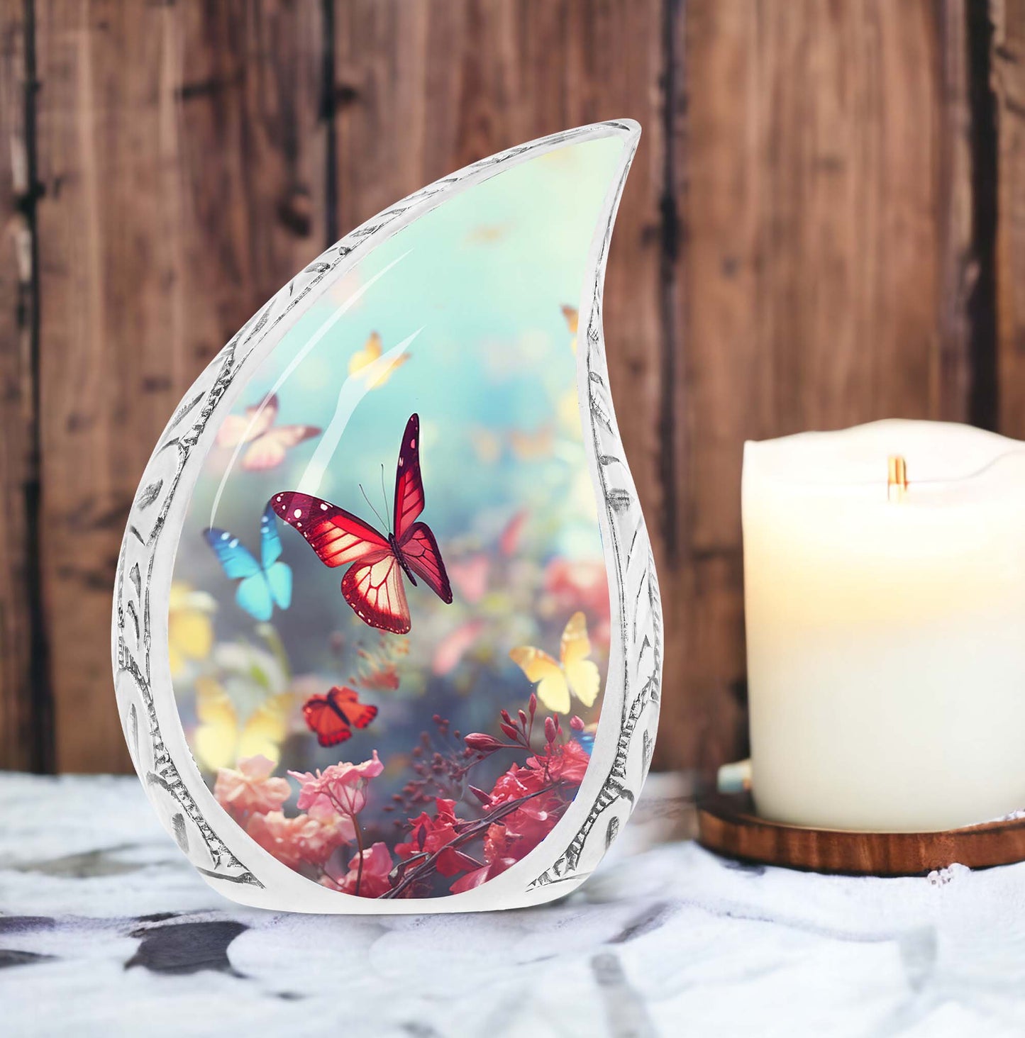 Colorful butterflies on a large urn intended for adult human ashes, specifically mothers