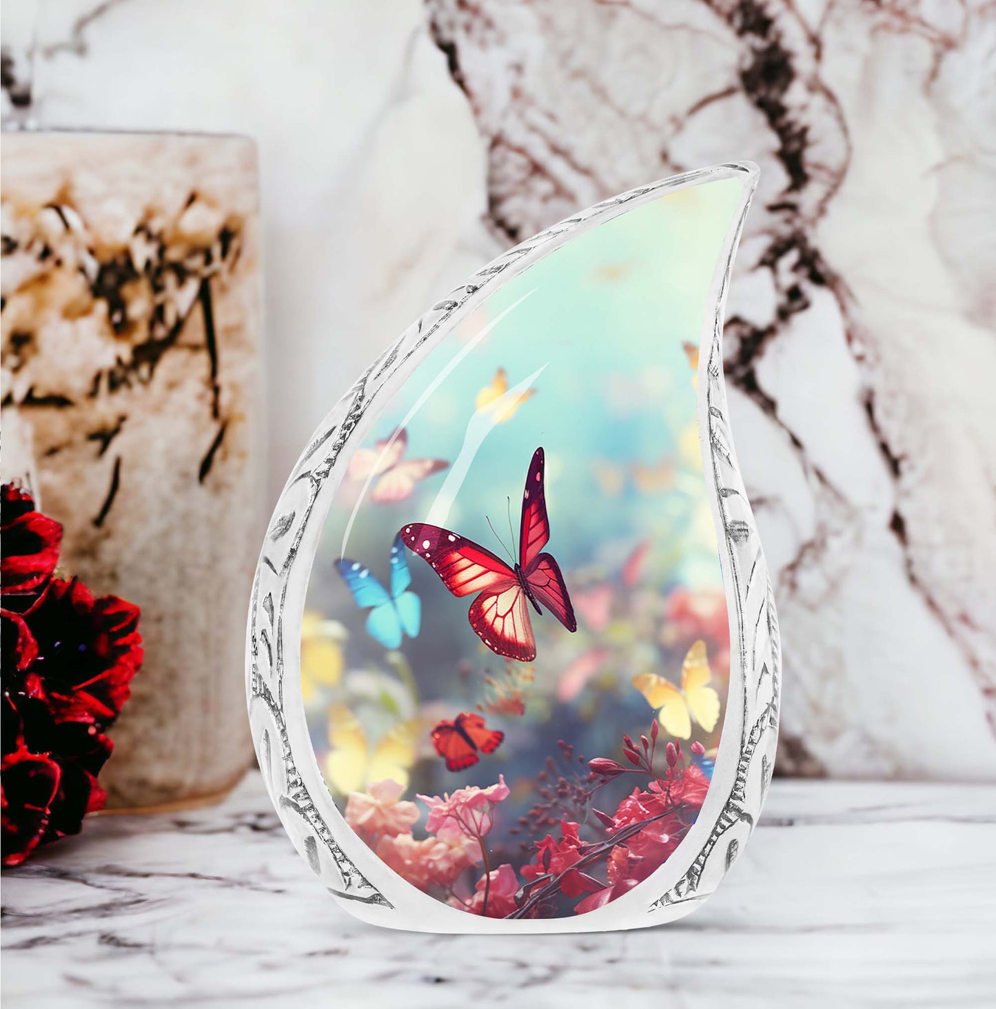 Colorful butterflies on a large urn intended for adult human ashes, specifically mothers