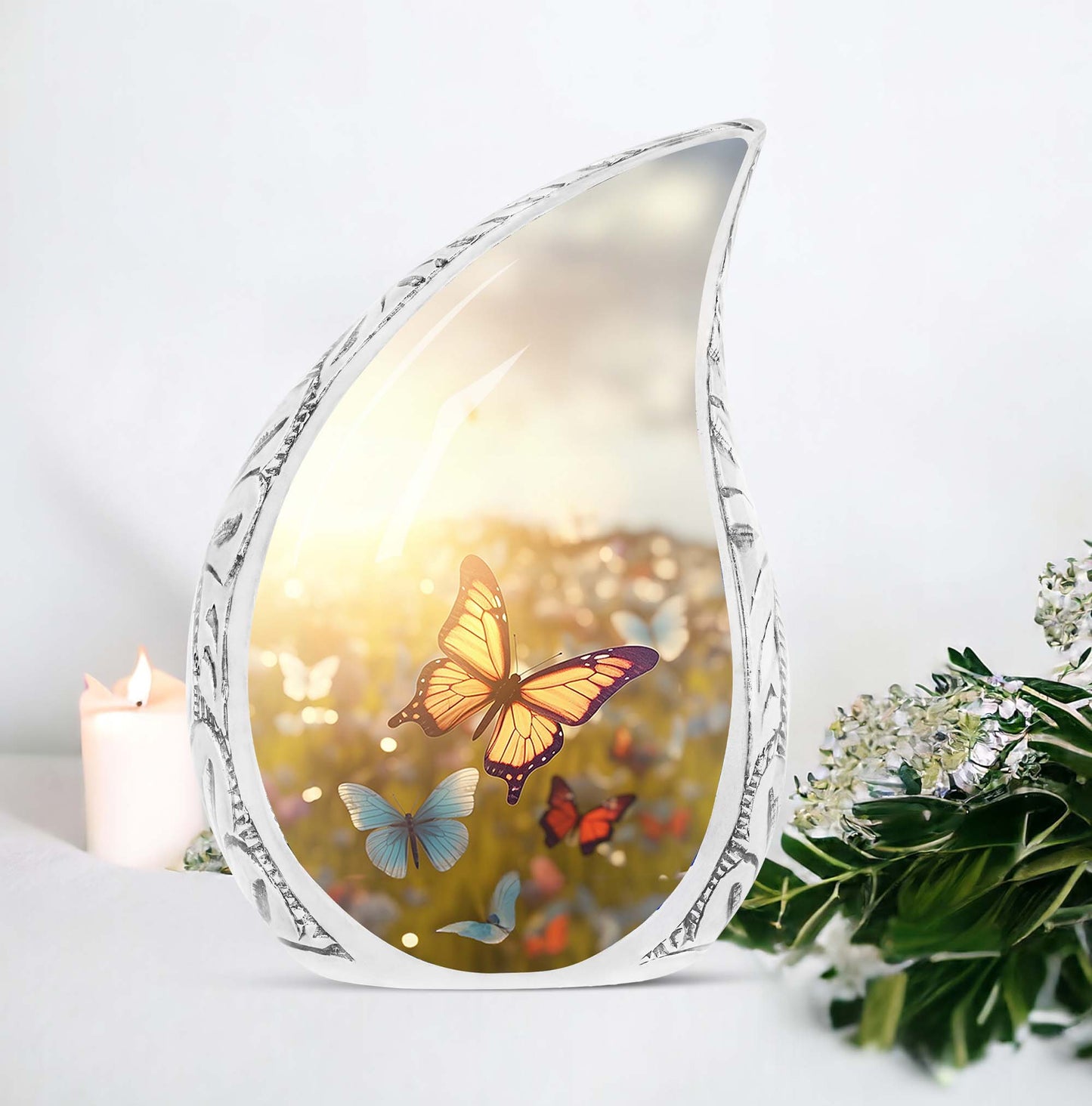 Large urn ornately designed with butterflies on a sunset meadow, ideal for human ashes adult female burial or cremation