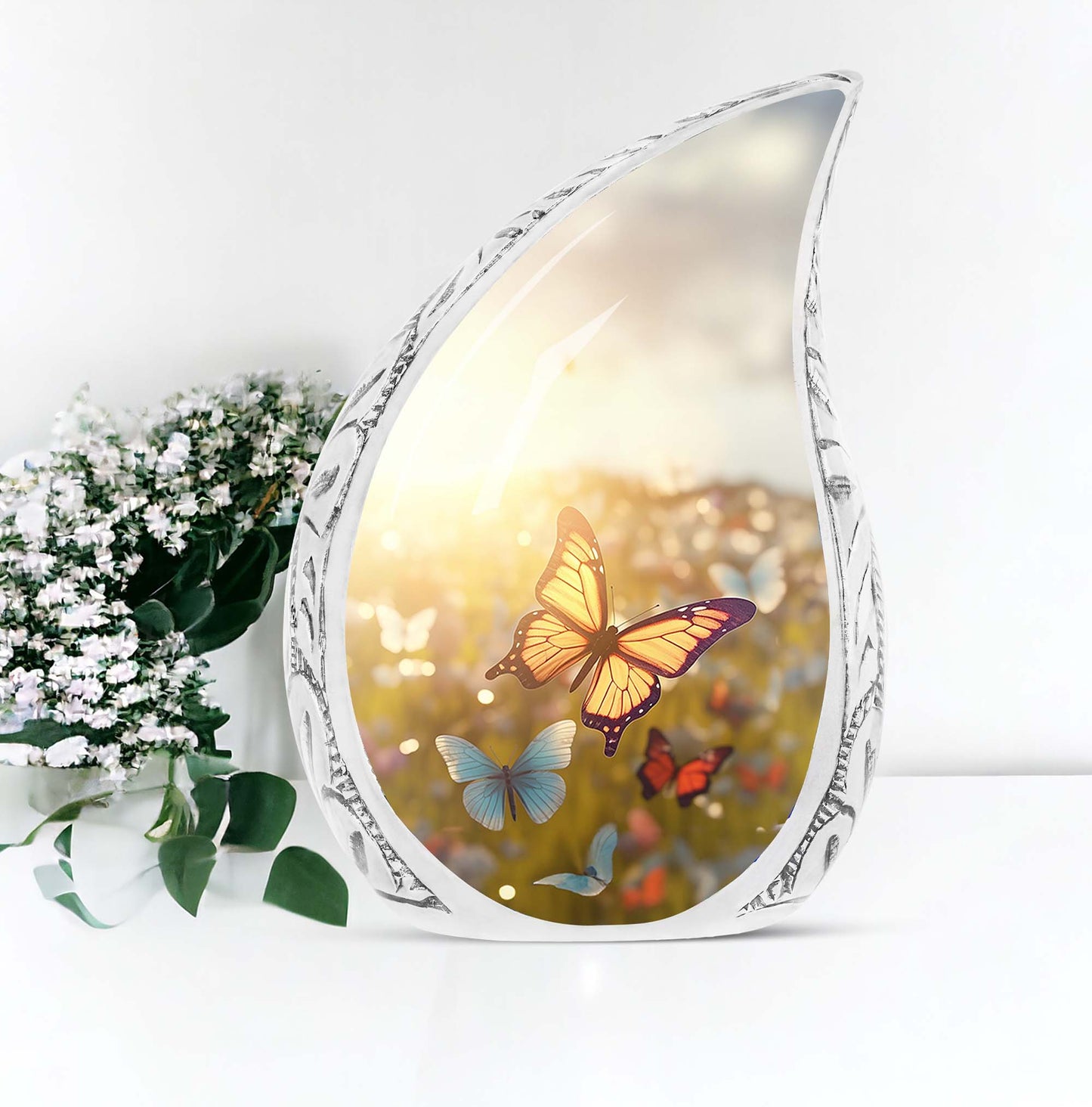 Large urn ornately designed with butterflies on a sunset meadow, ideal for human ashes adult female burial or cremation