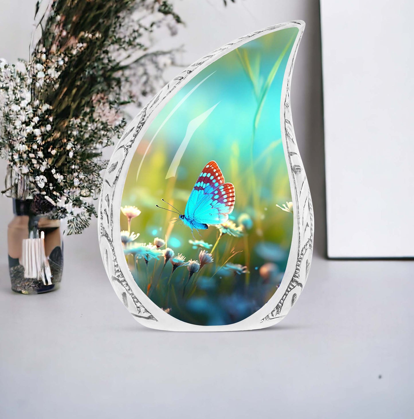 Large cremation urn for adults, featuring a unique butterfly design in a meadow, perfect metal container for ashes