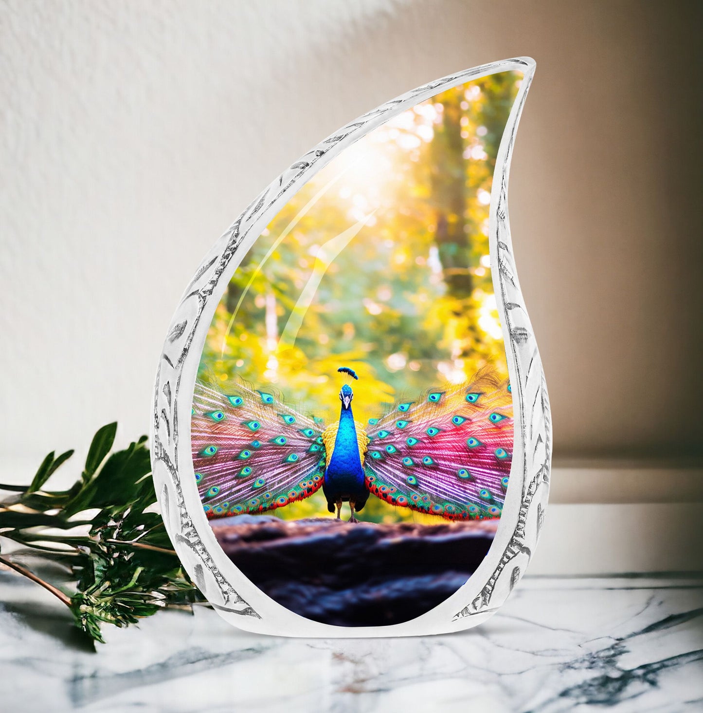 Large Peacock Urn for ashes showcasing its vibrant feathers in a garden setting, designed for adult human burial.