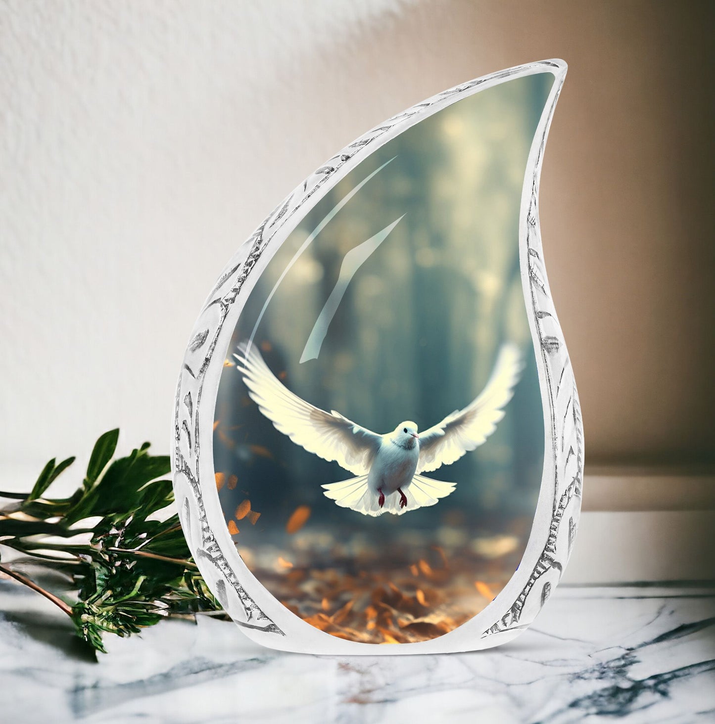 Large Dove Urn adorned with imagery of a dove in flight amidst fallen leaves, a suitable ashes holder for adult human ashes