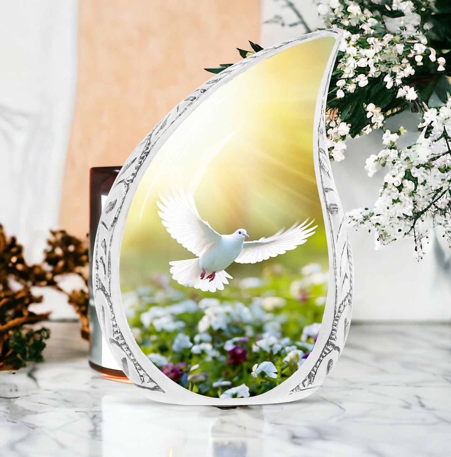 Large dove urn featuring white dove and colorful flowers, ideal for storing adult human ashes