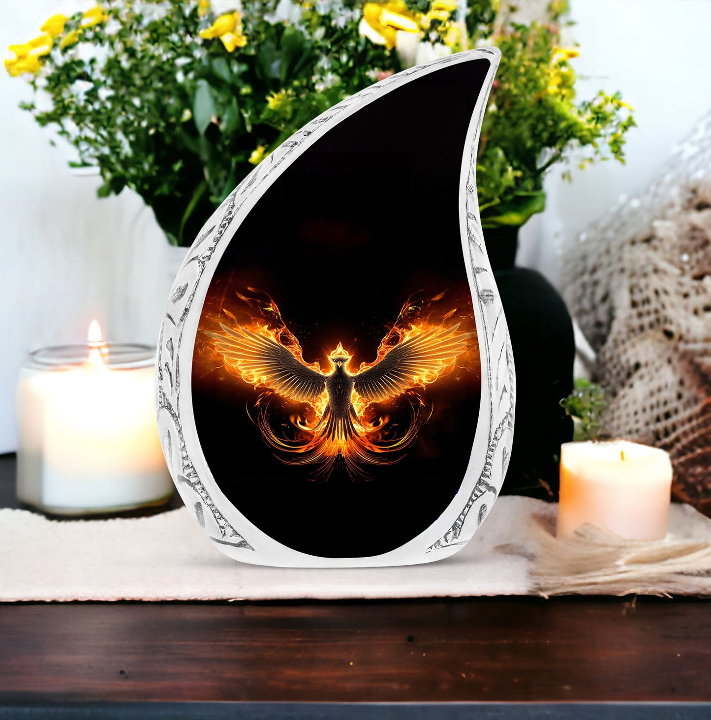 Dramatic black Phoenix urn for adult ashes, suitable for memorializing a loved one