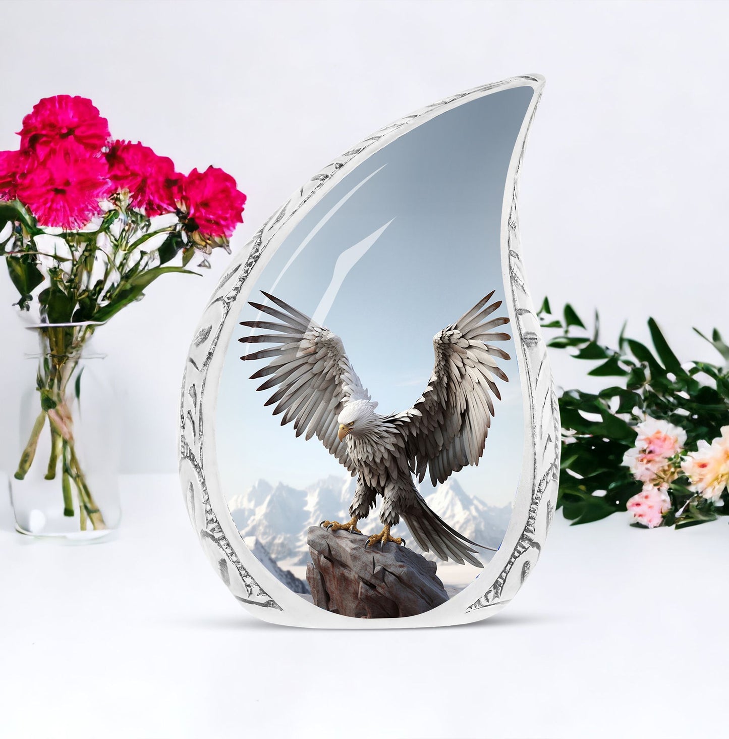 Large eagle urn in a serene snow mountain setting, designed for human ashes storage