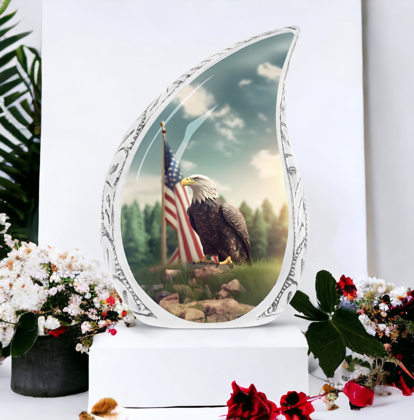 Large urn for human ashes depicting a striking eagle perched on a grassy hilltop