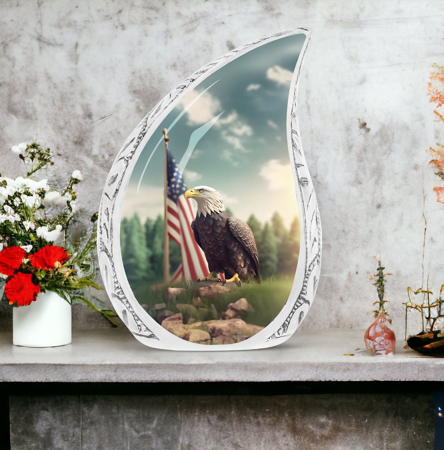 Large urn for human ashes depicting a striking eagle perched on a grassy hilltop