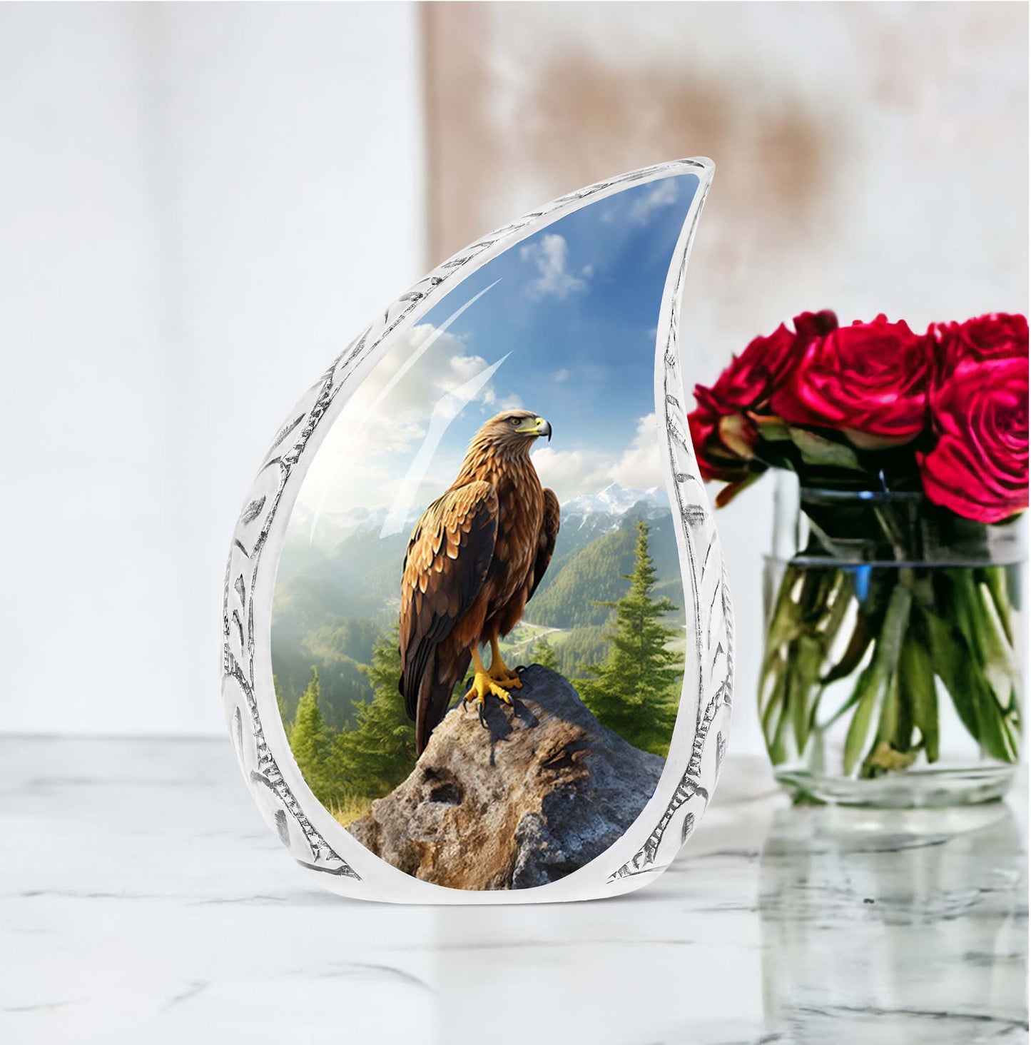 Portrait of an eagle perched on a large, stone urn designed for adult human ashes