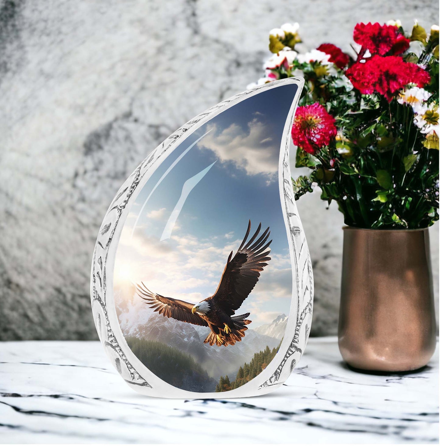 Large eagle urn portraying an eagle soaring in a valley, designed as a dignified ashes holder for adult human remains.