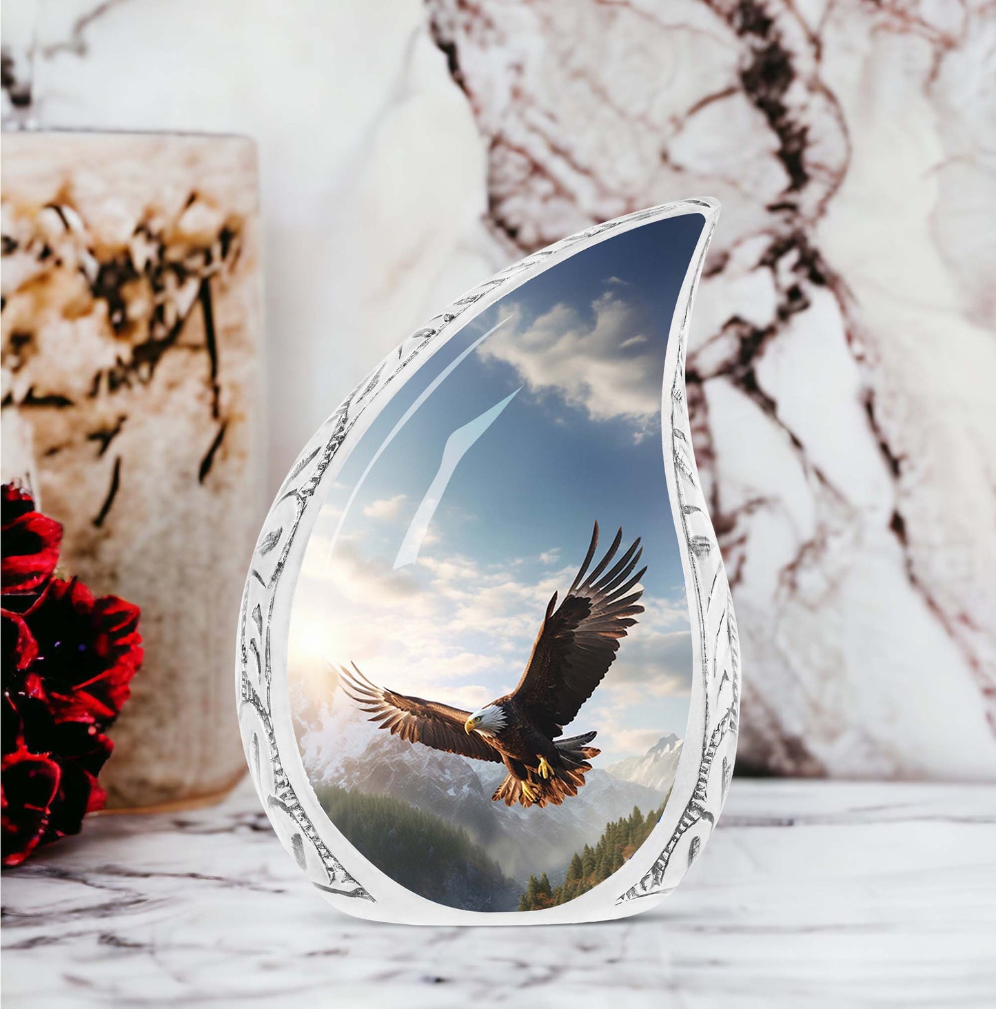 Large eagle urn portraying an eagle soaring in a valley, designed as a dignified ashes holder for adult human remains.