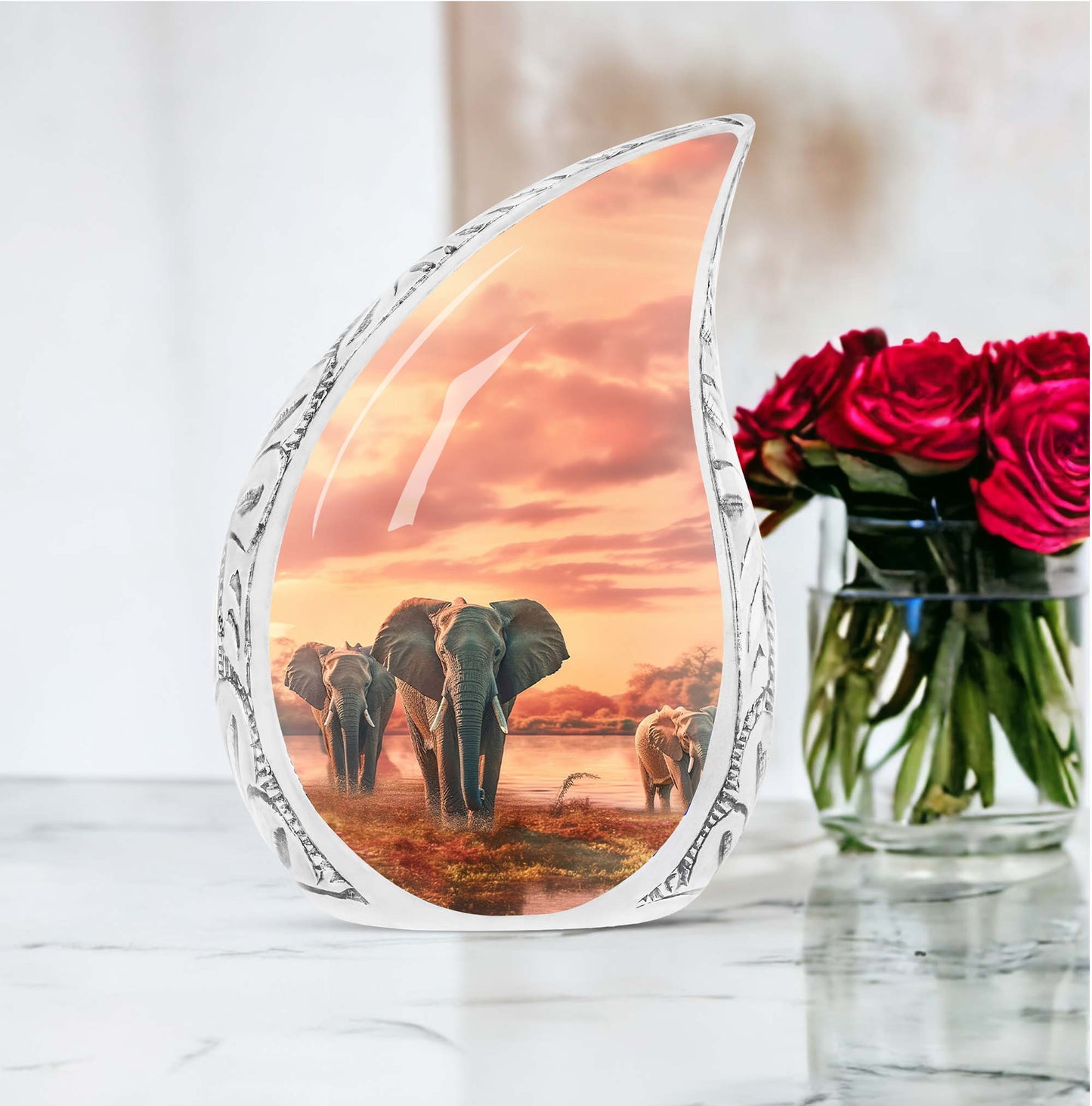 Large urn for human ashes featuring an elephant walking through a field design, suitable for funeral usage