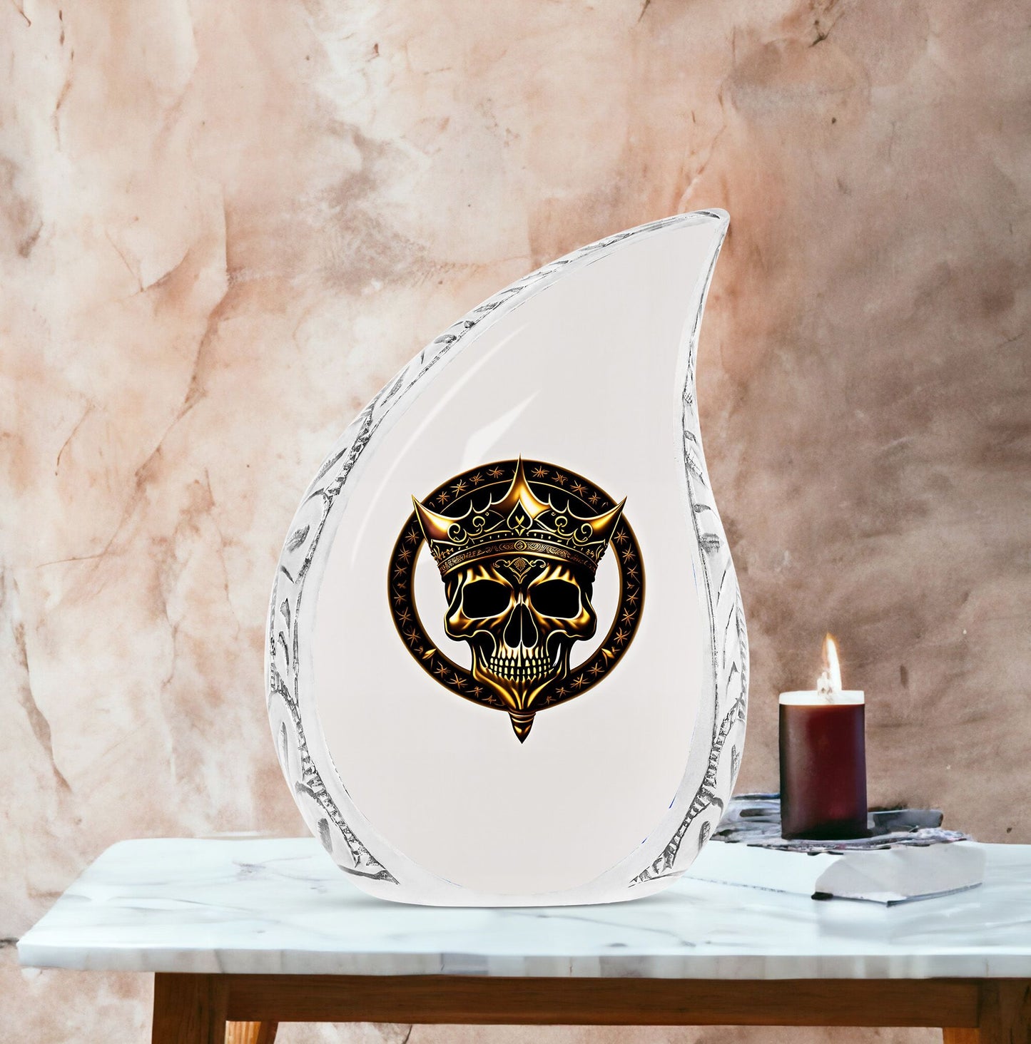 Large metal burial urn for adult ashes featuring a gold crown on a skull design, suitable for men