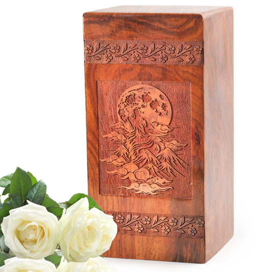 Large wooden urn with an intricate wolf theme designed for preserving cremation ashes, an ideal memorial urn for human ashes.