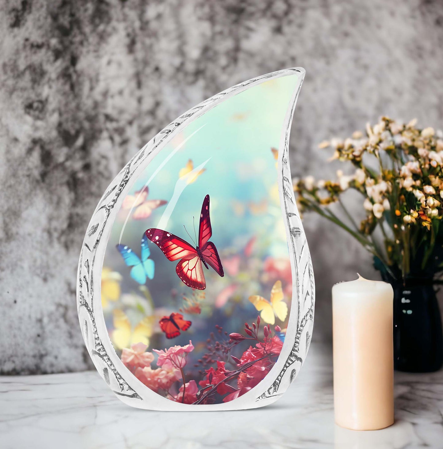 Colorful butterflies on a large urn intended for adult human ashes, specifically mothers