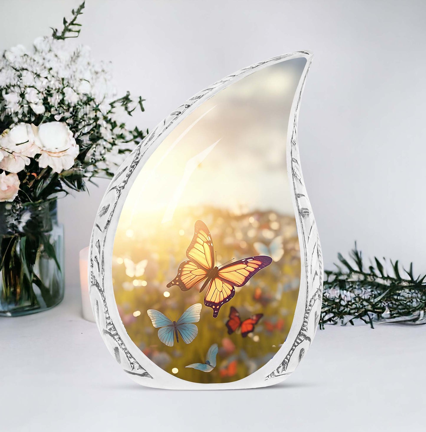Large urn ornately designed with butterflies on a sunset meadow, ideal for human ashes adult female burial or cremation