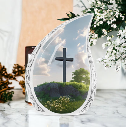 Large Christ-themed urn for adult ashes with serene garden background, ideal for memorial