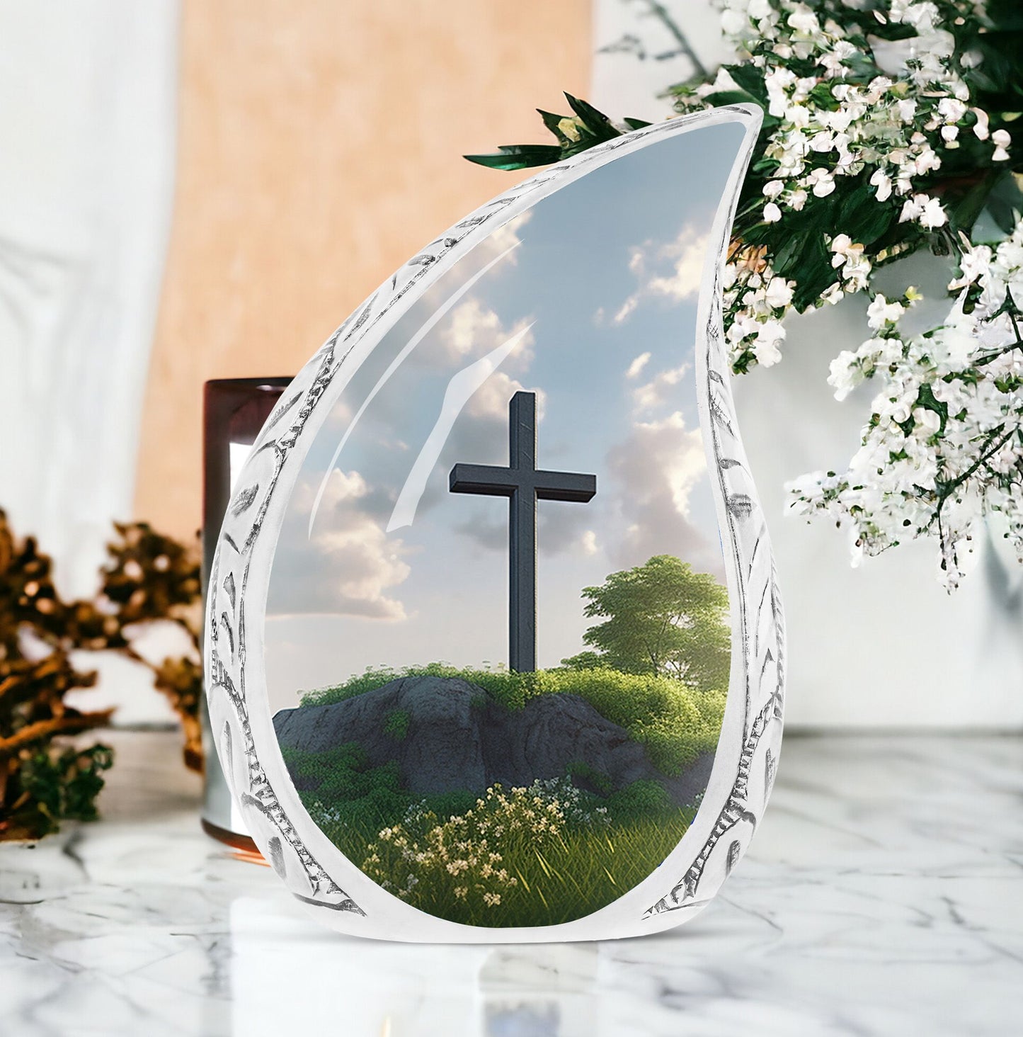 Large Christ-themed urn for adult ashes with serene garden background, ideal for memorial