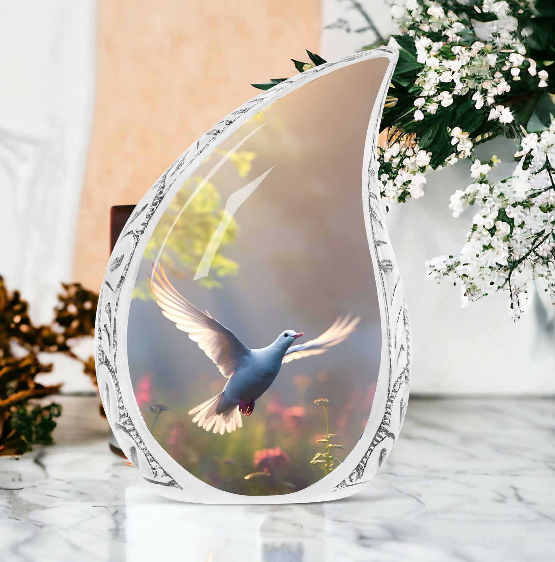 Large metal urn with depiction of a dove flying in morning light, used for containing ashes of adult male loved ones