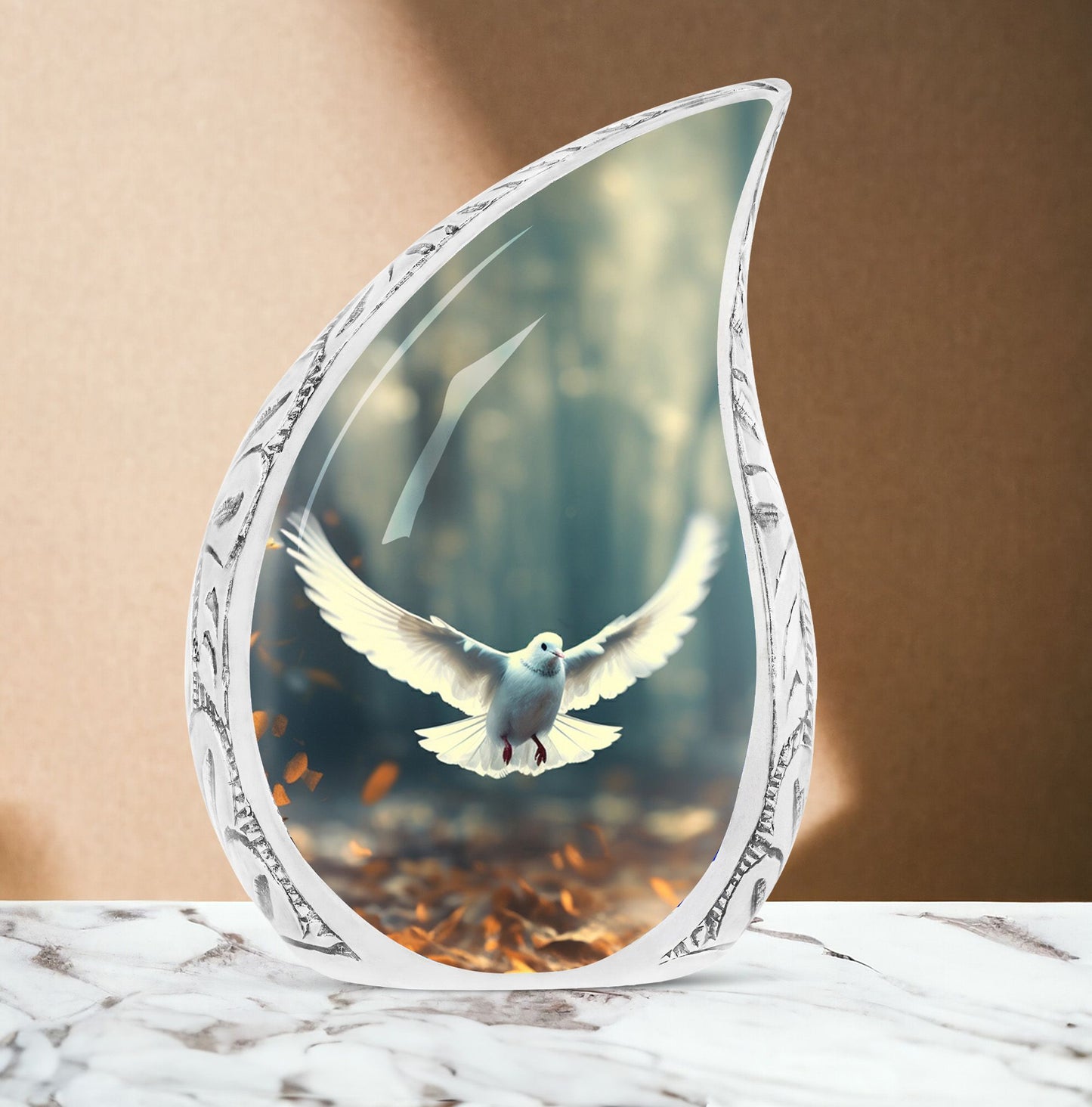Large Dove Urn adorned with imagery of a dove in flight amidst fallen leaves, a suitable ashes holder for adult human ashes