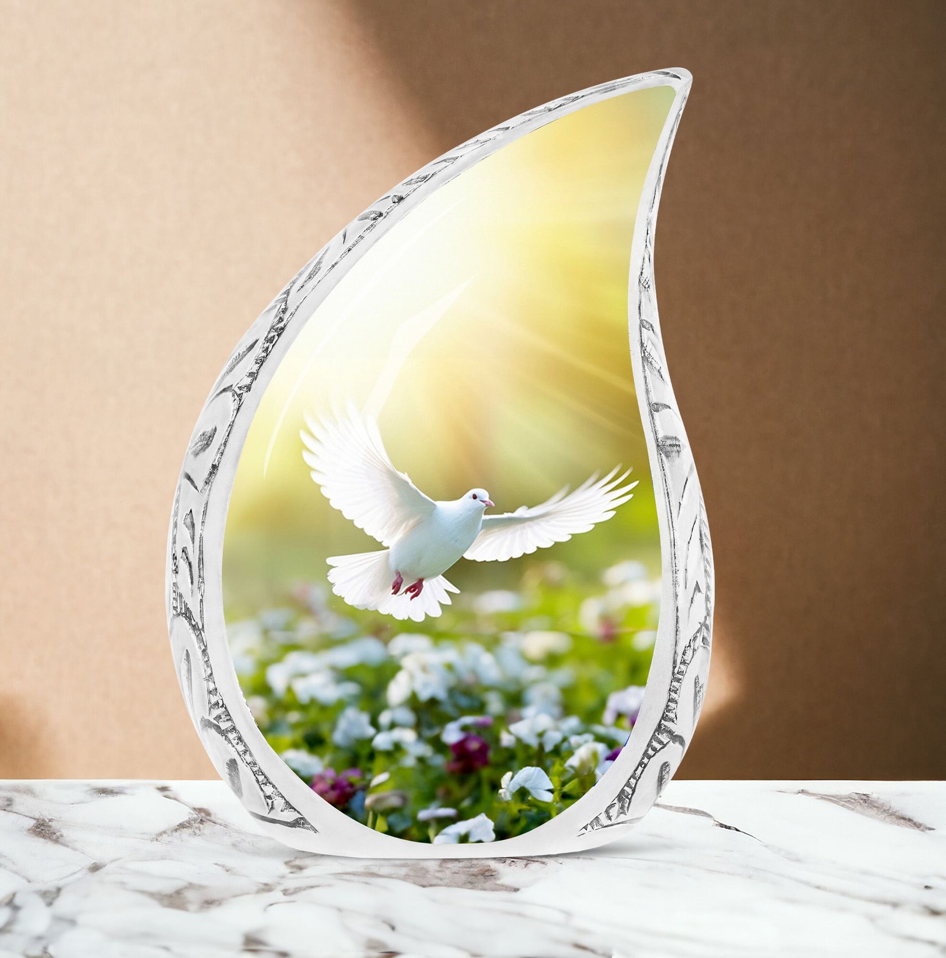 Large dove urn featuring white dove and colorful flowers, ideal for storing adult human ashes