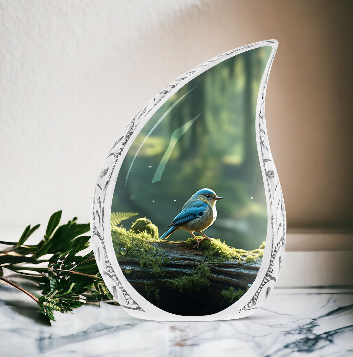 Large Blue Sparrow urn featured in a green forest setting, ideal for men's cremation purposes or companion urns