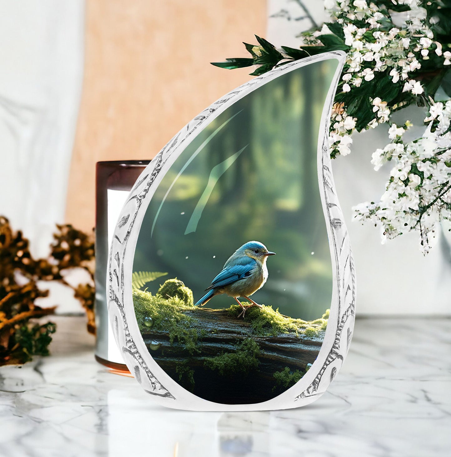 Large Blue Sparrow urn featured in a green forest setting, ideal for men's cremation purposes or companion urns