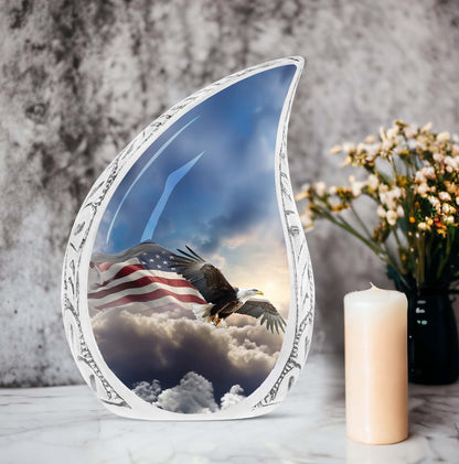 Large cremation urn with pictorial depiction of an eagle flying amidst clouds towards a flag, perfect for memorials