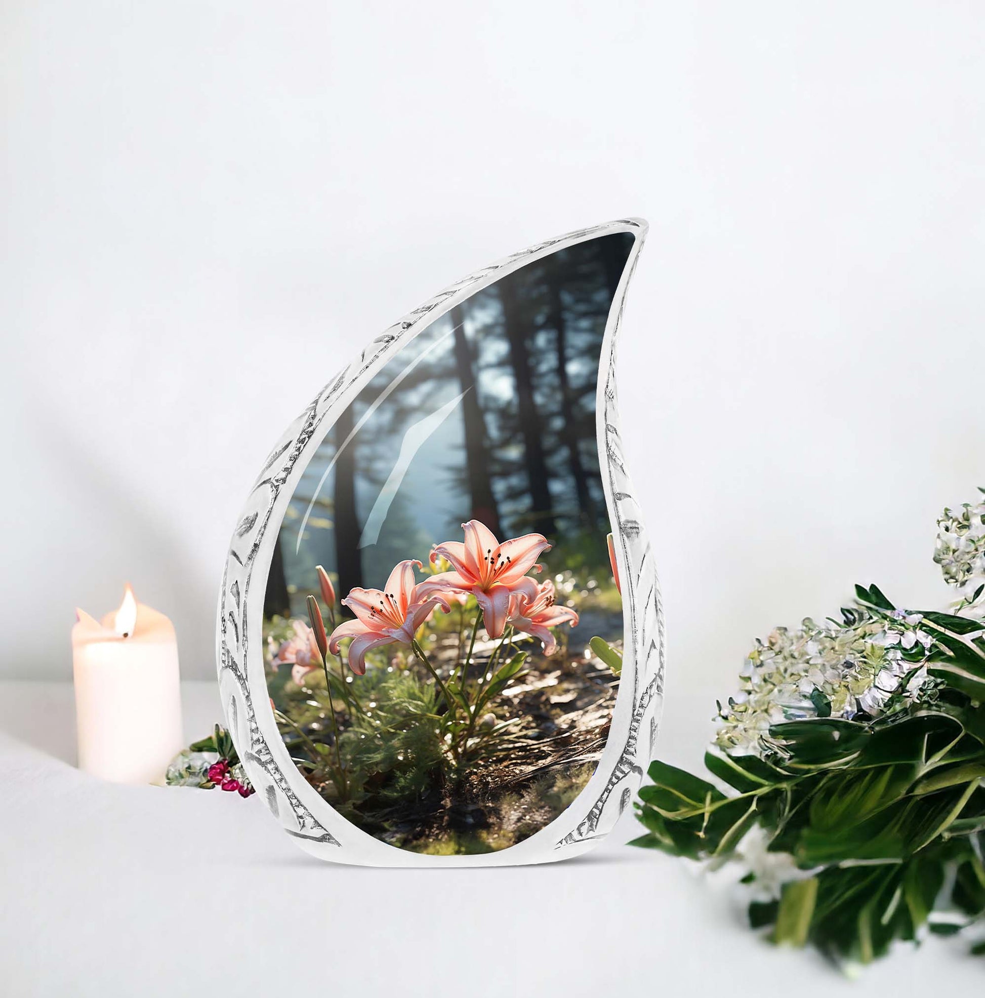 Large cremation urn with pink lily design for adult human ashes in a forest setting