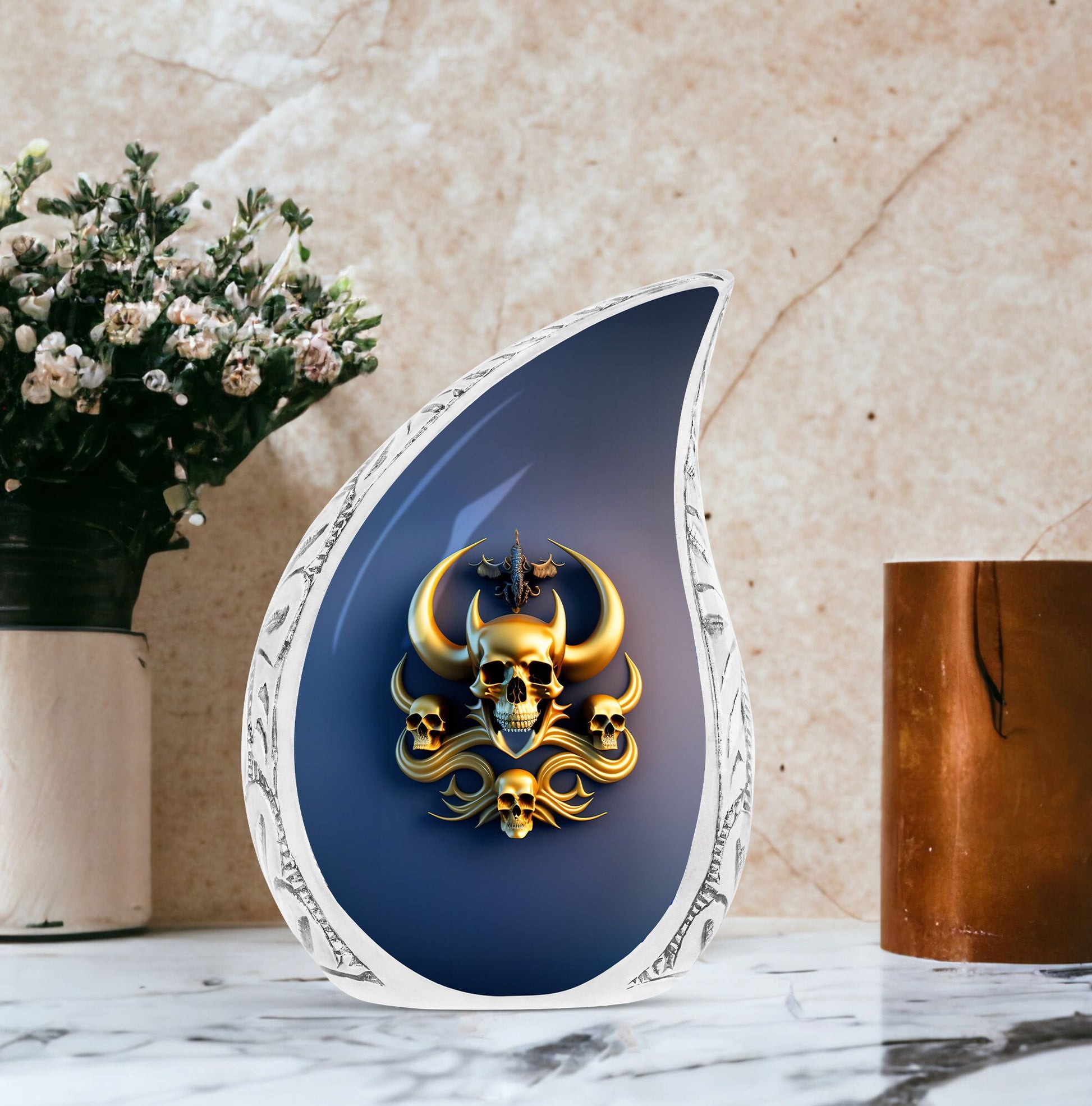 Gold skull with horns urn for human ashes on blue background, suitable for adults
