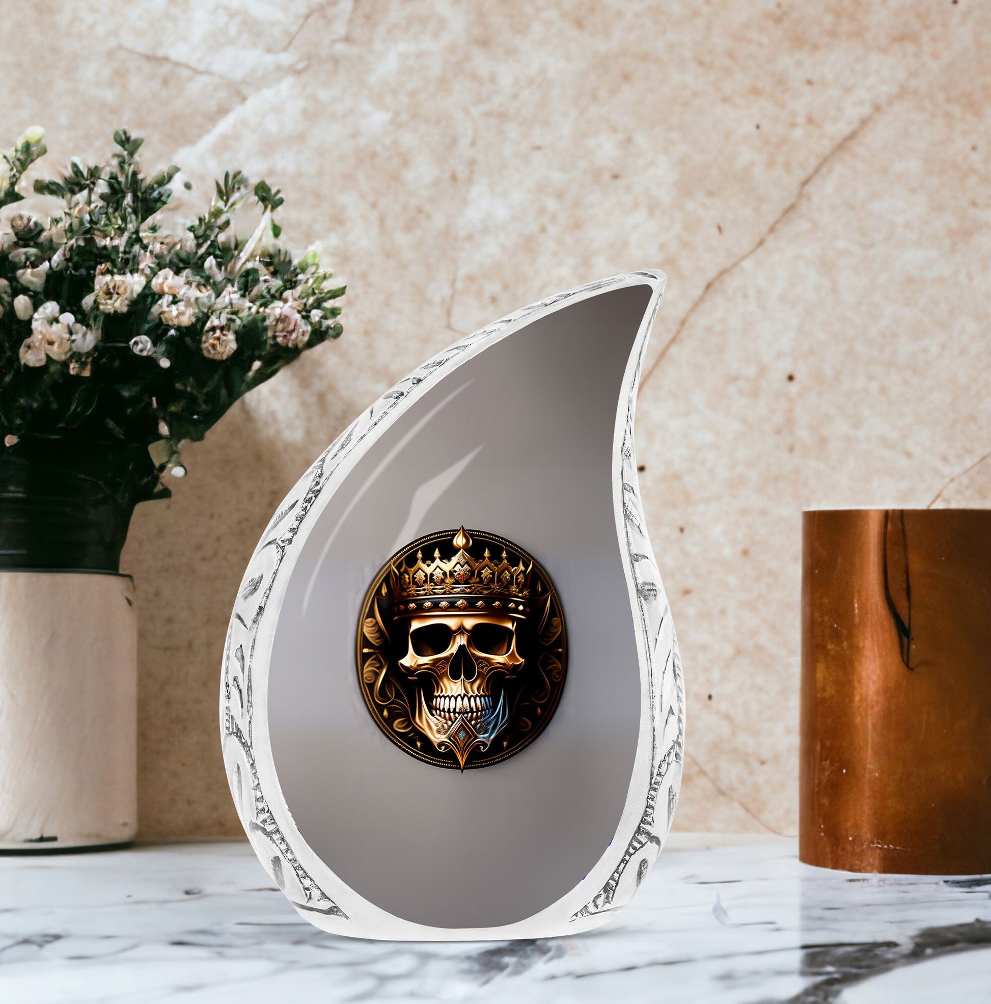 Large metal cremation urn for adults, featuring a skull with a crown design