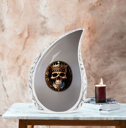 Large metal cremation urn for adults, featuring a skull with a crown design